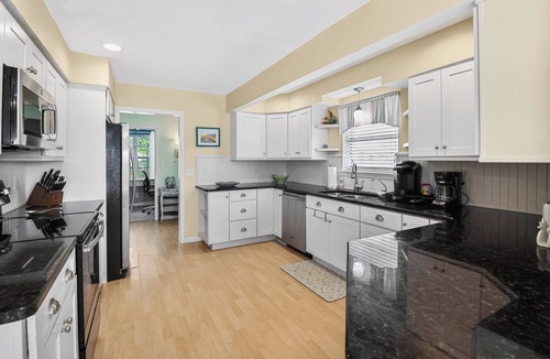 Tybee Island Cottage | Hot Tub + Screened Porches │ Private Dock & Marsh Sunset Views