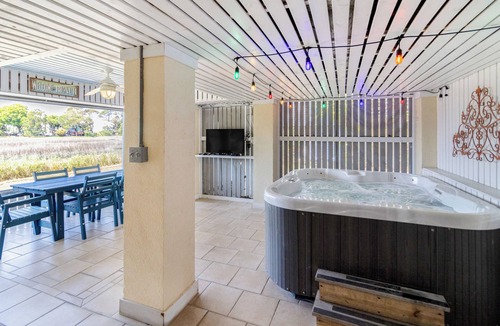 Tybee Island Cottage | Hot Tub + Screened Porches │ Private Dock & Marsh Sunset Views