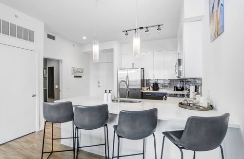 Channel District Apartment | Includes access to top of the line Gym, Luxary Pool, & City View Sky Lounge