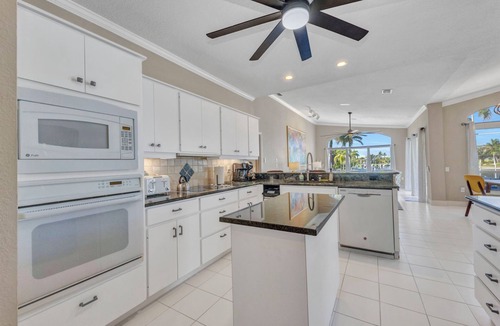 Burnt Store Isles House | INCREDIBLE WATER VIEW! NEW LUXURY REMODELED HOME; HEATED SALT POOL, GOLF NEARBY