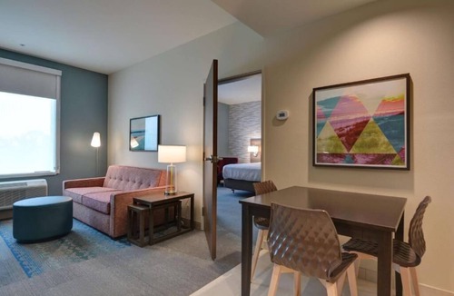 Upper Grand Lagoon Hotel | Indulge in Home Like Comfort w/Pool & Gym Onsite + Free Breakfast