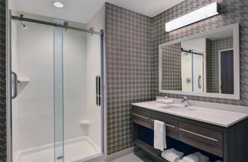 Upper Grand Lagoon Hotel | Indulge in Home Like Comfort w/Pool & Gym Onsite + Free Breakfast