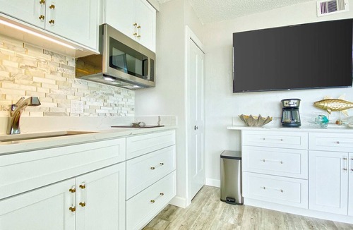 Belleair Beach Condo | Inviting Gulf front condo with pool beach access private balcony and central AC