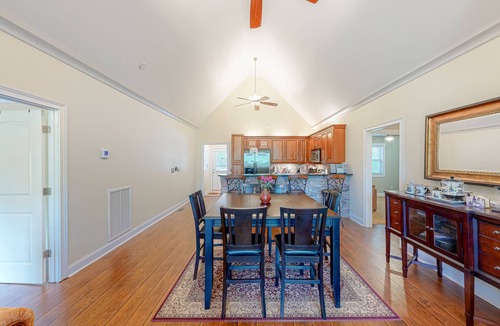 Sparta House | Inviting waterfront home with fireplace, dock, patio, central AC, & W/D