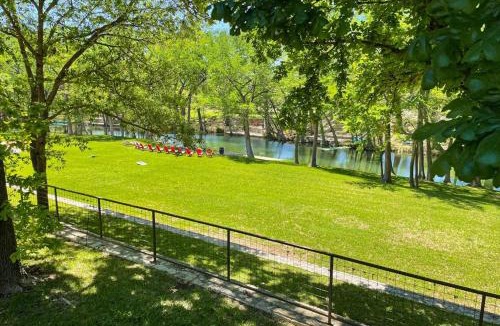 Hunt House | Inviting Waterfront Home with Pool, Patio, Fireplace, W/D, & Dog-Friendly