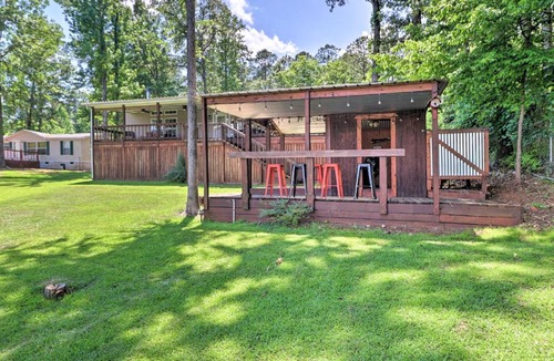 Milledgeville House | Irish Rover Lake Home with Yard Bar and Dock!