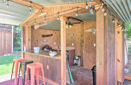 Milledgeville House | Irish Rover Lake Home with Yard Bar and Dock!