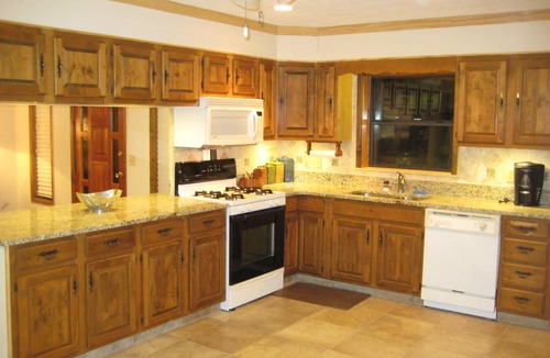 Edgar House | Island Lake Redwood Cottage With Canoe and Grill: Relax, Swim, Fish, Ski, Enjoy