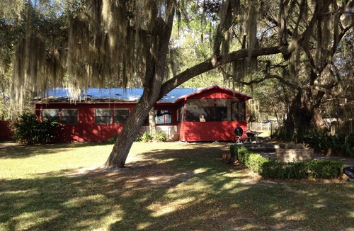 Edgar House | Island Lake Redwood Cottage With Canoe and Grill: Relax, Swim, Fish, Ski, Enjoy