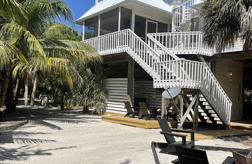 Jose's Hideaway House | Island Paradise: Steps to Private Gulf Beaches, Pools, Hot Tub & Golf Cart ALL