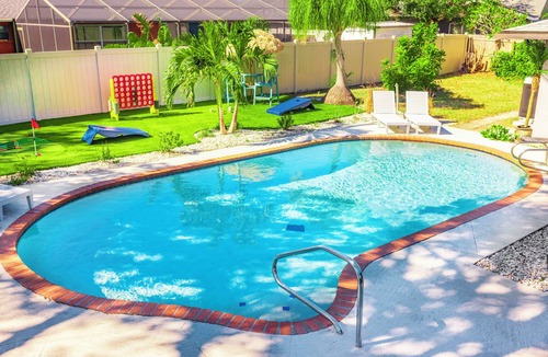 Pine Lakes House | Island Song- Heated saltwater pool, putt putt, games, Anna Maria Island and IMG