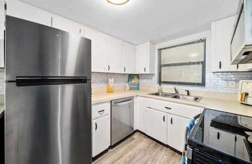 Daytona Beach Condo | Island Time Oasis Pool Walk to Beach & Balcony