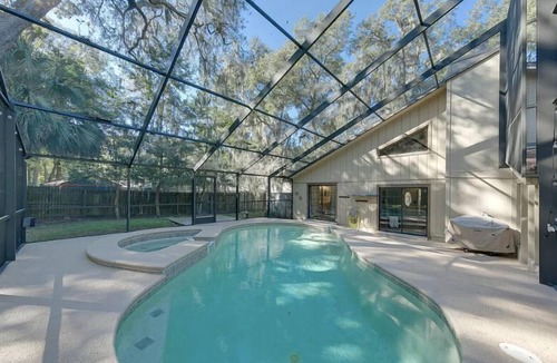 East Arlington House | Jacksonville Beach House Heated Pool 8 min to Hannah Park Beach Pet Friendly