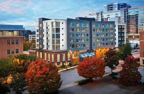 Greenville Downtown Apartment | King Comfort x2: Free WiFi, Indoor Pool, Steps from Bon Secours Arena