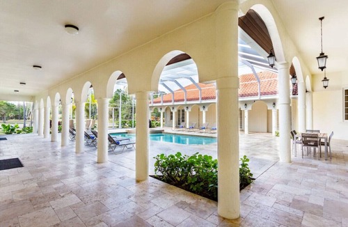 Rural Estates House | Knickerbocker Estate: Exclusive 9-BR Getaway in Naples. Enjoy Private Pool, Outdoor Dining, and Expansive Grounds, Experience Tranquility with Easy Access to Naples' Best!