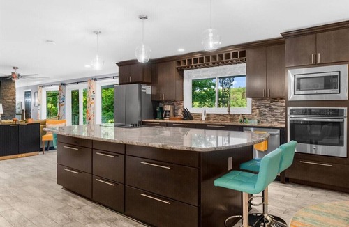 Buford House | Lake Lanier Lake House with Private Dock Hot Tub Pet-friendly Game Room