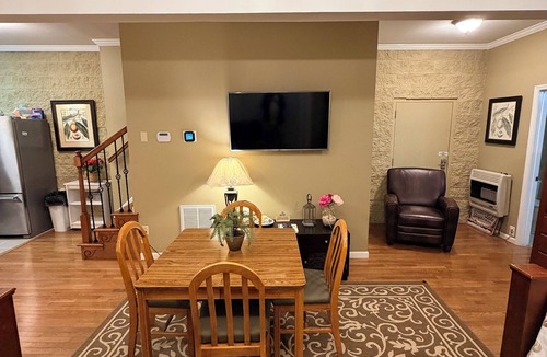 Fackler Apartment | Lake side apartment with shared 100’ pier and pavilion with rock BBQ pit.