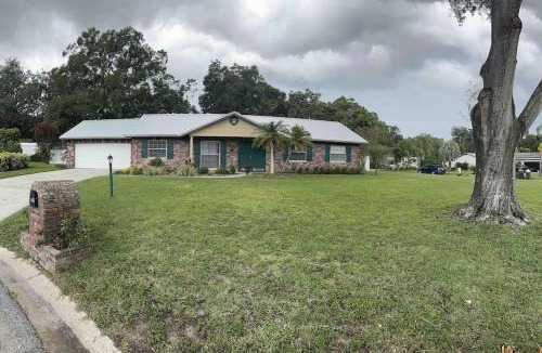 Brandon House | Lake Valrico's Camelot Court with HEATED POOL & access to private lake