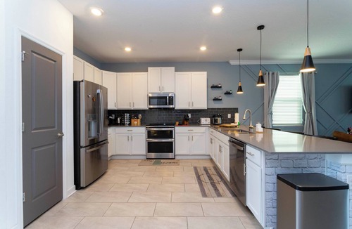 Kissimmee House | Lakefront 9 Bedroom Villa: Arcade, Themed Rooms, Lazy River