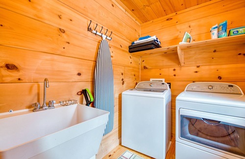 Mills River House | Lakefront cabin & tiny home with a firepit, wet bar, washer/dryer, dock