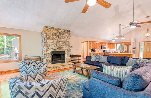 Livingston House | Lakefront home with deck, hot tub, game room, kayaks, & fireplace