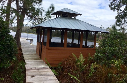 Hawthorne House | Lakefront Log Home, Screened Heated Pool, & Recreation House