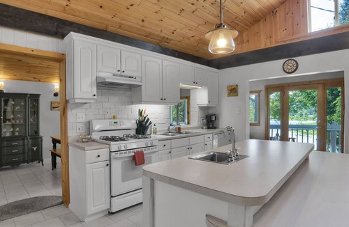 Lake Ariel House | Lakefront, Private Dock, Boats, Hot Tub, Fire Pit, Family Friendly