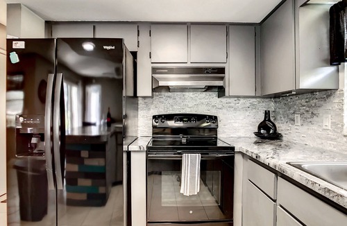 Regency Park House | LAKEFRONT PROPERTY, LARGE HEATED POOL, newly renovated. Welcome to "Our Nest"
