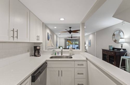 Sandestin Condo | Lakefront Villa w/2 GOLF CARTS! Screened Porch, Bay Views. Near Beach & Pool