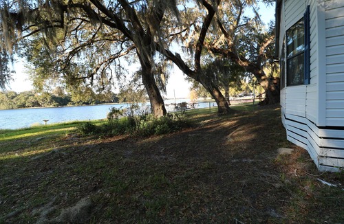 Hernando House | Lakeview from your living room. Water touches the back yard.