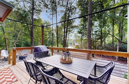 Mills River House | Lakeview tiny home with a loft, full kitchen, furnished deck, & firepit