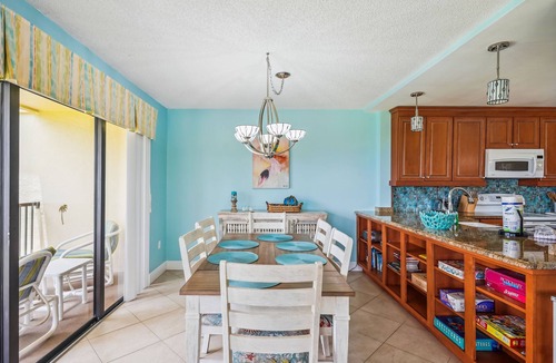 Sunset Beach Condo | Land's End 201 building 8 Bright beach front, corner condo with stunning view