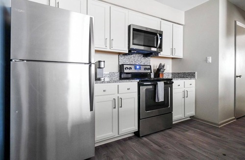 Crabtree Apartment | Landing | Chic 2BD, Pool, Tennis Court