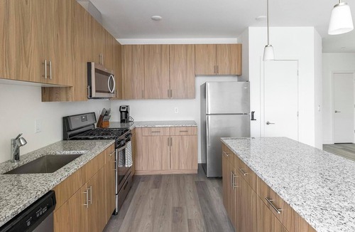 Carteret Apartment | Landing | Chic 2BD, Rooftop Lounge, Gym