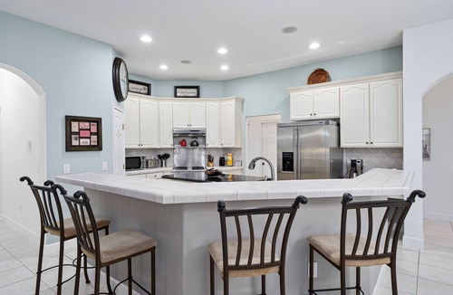 Ridgewood Lakes House | Large 4/5 bedroom private screened pool home on quiet street not overlooked