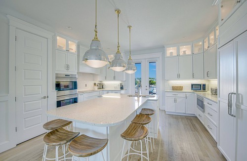Anna Maria House | Large Canal Front Family Rental on Anna Maria with Pool, Dock & Mini Golf!
