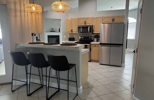 Palm Coast House | Large Charming House with Heated Pool and Outdoor Living