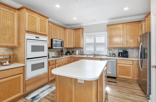 East Beach House | Large Home with Pool, Kids' Play Den and Steps to Beach