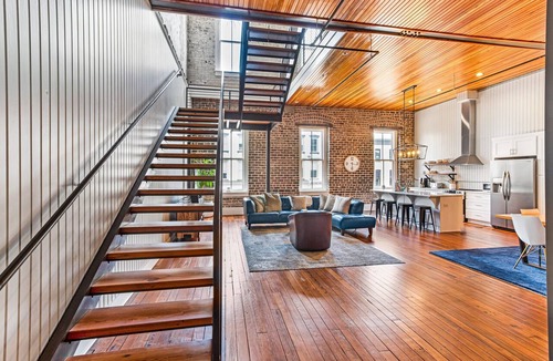 Historic District - North Condo | Large, Stylish Two-Story Loft Overlooking Broughton Street by Lucky Savannah