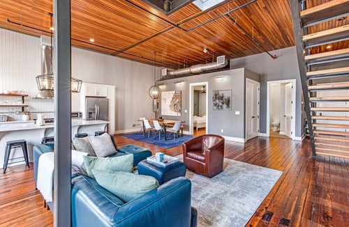 Historic District - North Condo | Large, Stylish Two-Story Loft Overlooking Broughton Street by Lucky Savannah