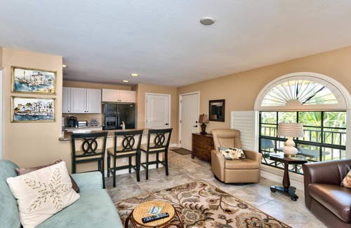 Old Naples Condo | Le Monaco - Romantic 1 BR Condo Steps from 5th Ave S. Chic Coastal Retreat with King Bed and Beach Access. Perfect Location for Couples Near Dining, Shopping, and Naples Beach