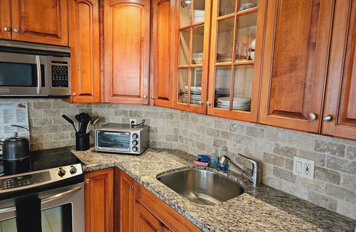 Galt Mile Condo | Lovely Beachfront Condo overlooking the Ocean, private jacuzzi, balcony & pool
