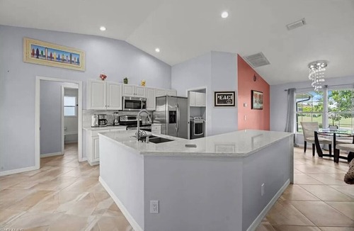 Pelican House | Lovely Home with Canal View, Heated Pool, Boatlift, Stunning Sunsets