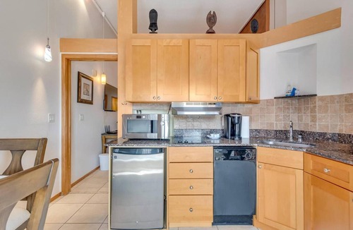 Palm Coast Condo | Lovely Oasis Condo | Balcony with Courtyard Views | European Village | Near Beaches & Dining