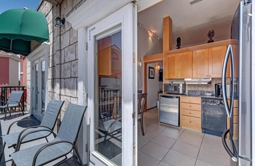 Palm Coast Condo | Lovely Oasis Condo | Balcony with Courtyard Views | European Village | Near Beaches & Dining