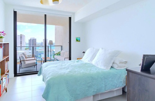 Town Square Condo | Lunabase ☾ Remote Life Dream | Smart Condo, Spacious Lounge Patio, Book Haven, Workspace, Parking