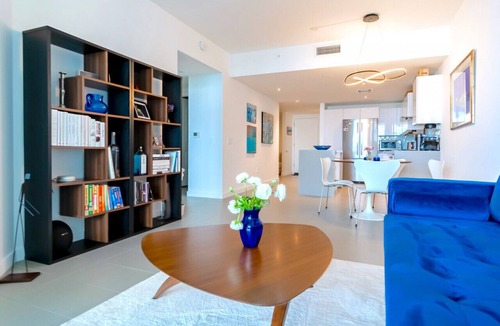 Town Square Condo | Lunabase ☾ Remote Life Dream | Smart Condo, Spacious Lounge Patio, Book Haven, Workspace, Parking