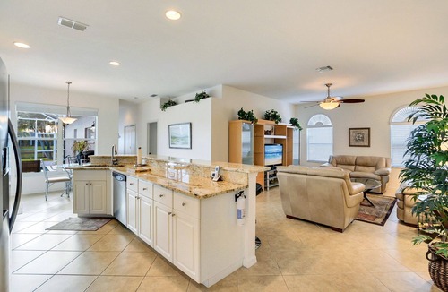 Central Naples House | Luxurious 4 bedroom 3 bath private pool home with gorgeous lake views!