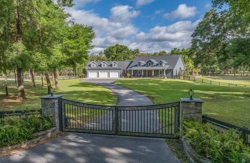 Inverness House | Luxurious 6-bedroom estate with pool, on over 6 fenced in acres