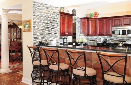 Windy Hill Hotel | Luxurious Oceanfront 5-Bedroom Condo with Sweeping Views and Modern Amenities